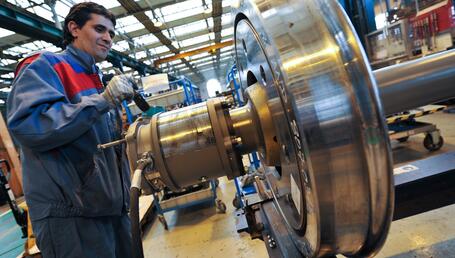 Manufacturing_Train_Bogies_Coradia_Polyvalent_Put_Wheeled_Site_Alstom_Transport_Le_Creusot_May_2011.jpg